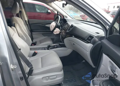 2019 Honda Pilot Touring z USA, uszkodzony, nr VIN 5FNYF5H92KB025374